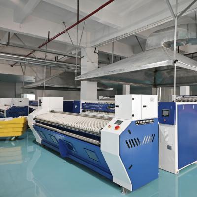 工業洗滌高峰季產能提升方案 - 廣屹智能送布機實戰案例解析